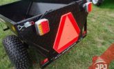 Trailer-behind-four-wheel-with-lighting-