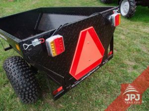 Trailer-behind-four-wheel-with-lighting-